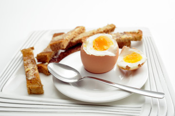 Boiled egg breakfast with toast soldiers