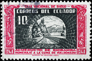 Ancient aqueduct on vintage stamp of Ecuador