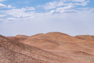 Barren gobi desert landscape under sky at the historical site of Yang Pass, in Yangguan, Gansu, China