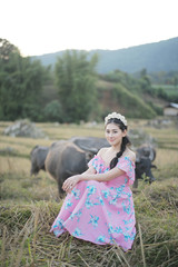 Beautiful girl with buffalo