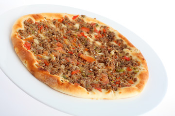 Fataya with a meat and pickle topping