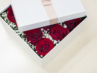 Romantic red roses, close up of box with red roses, Preserved roses in a box.