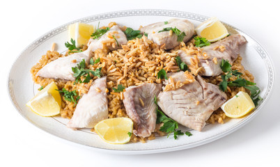 Lebanese fish rice and nuts serving dish