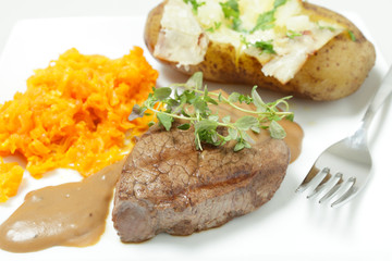Filet mignon meal with fork