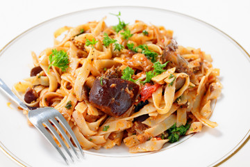 Eggplant in tomato sauce with pasta