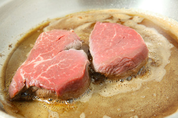 Cooking filet mignon in frying pan