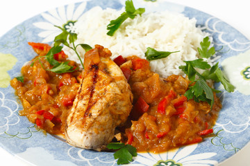 Grilled chicken breast with tomato sauce