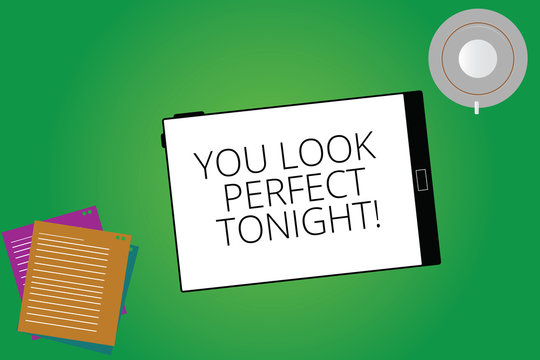 Writing note showing You Look Perfect Tonight. Business photo showcasing Flirting beauty appreciation roanalysistic feelings Tablet Screen Cup Saucer and Filler Sheets on Color Background