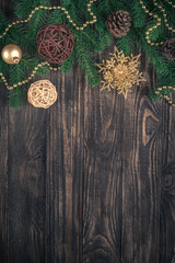Christmas food background with spices and nuts on dark wooden ta