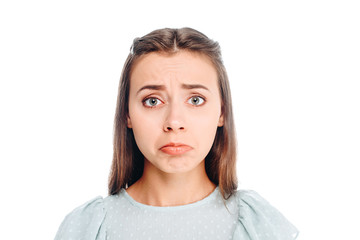 portrait of sad young woman isolated on white