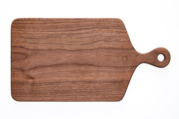 Handmade walnut chopping board. Walnut chopping board texture background.	