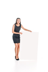 emotional woman in black dress with blank banner isolated on white