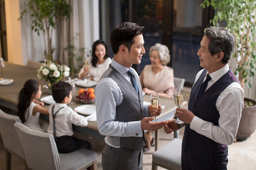 Noble family eating holiday meal together