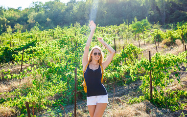 Beautiful blonde in the vineyards