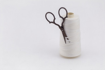 retro scissors with a ball of twine, homemade needlework