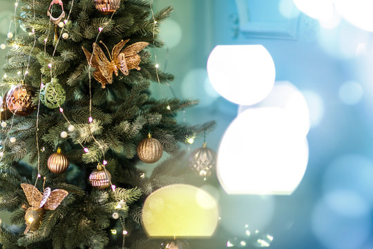 Christmas tree with gift close up. Christmas interior.