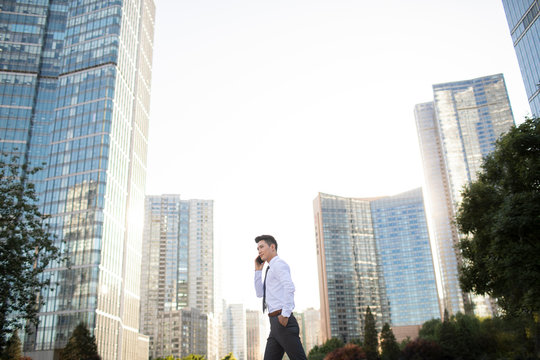 Confident young businessman on the phone