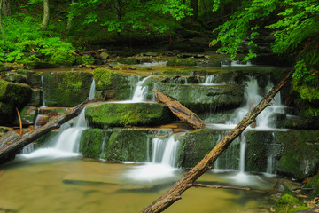 Naklejka premium Waterfall on the Hulski stream. Bieszczady Mountais, Poland.