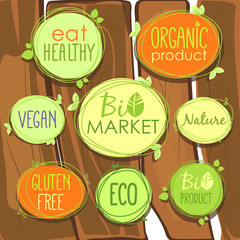 Vector Bio icon set on a wooden fence of labels, stamps or stickers with signs - Bio market, gluten free, organic product, vegan, food healthy, eat healthy, organic, bio product, nature, Eco food