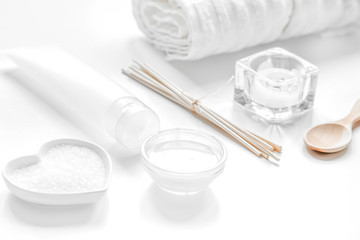 body care concept with white set of cosmetics woman desk top vie