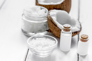 cosmetic concept with fresh coconuts on white table background m