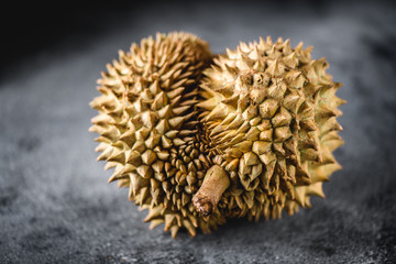 Naklejka na ściany i meble Durian exotic fruit from Asia on concrete table