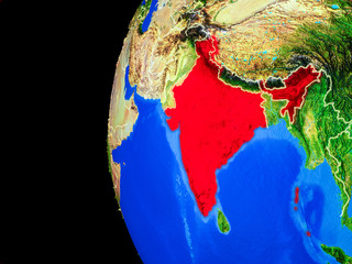 India from space on realistic model of planet Earth with country borders and detailed planet surface.