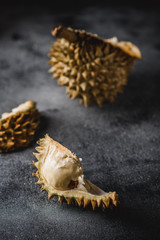 Naklejka premium Durian exotic fruit from Asia on concrete table