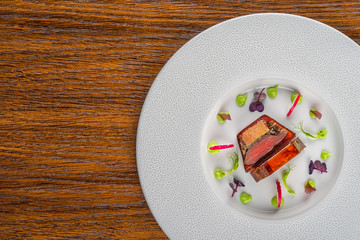 delicious apetizer with fresh vegetable served on white plate, modern michelin food