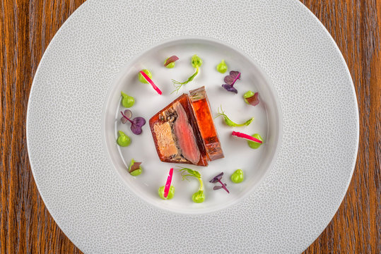 delicious apetizer with fresh vegetable served on white plate, modern michelin food