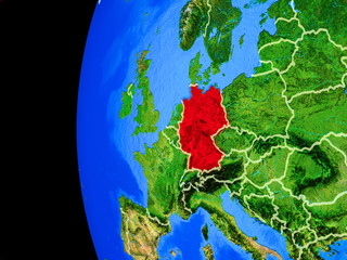 Germany from space on realistic model of planet Earth with country borders and detailed planet surface.