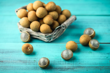 Longan exotic fruits from tropical countries on table. Sweet translucent flesh