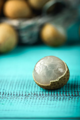 Longan exotic fruits from tropical countries on table. Sweet translucent flesh