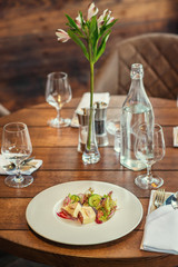 delicious apetizer with fresh vegetable served on white plate, modern michelin food