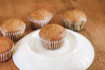 Bakery fresh banana cup cake hot from oven , home made food.