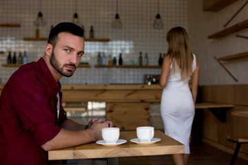 Quarrel between loved young man and woman.