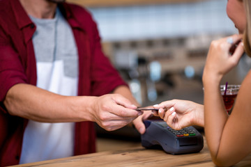 Paying by credit card in cafe
