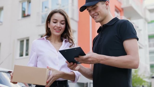Express Delivery Service. Woman Receiving Package From Courier