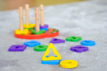 Wooden educational math toys ,math games material colorful early learning game. Selective focus.