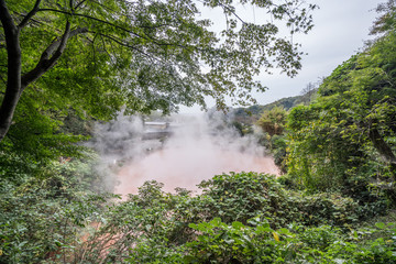 Chinoike Jigoku (Blood Pond Hell) pond in autumn, which is one of the famous natural hot springs viewpoint, representing the various hells in Beppu