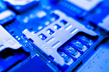 Abstract phone processor closeup, sim card slot. Information on the computer microchip concept,...