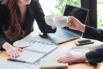 Young girl is drinking coffee at coffee shop,Businessmen are talking about work on a coffee shop.