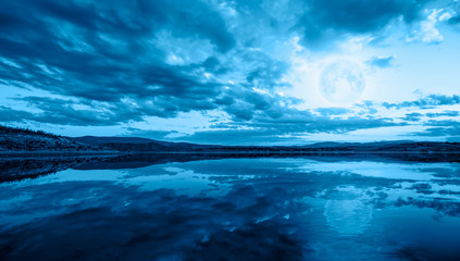 Night sky with moon in the clouds 