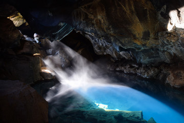 
the famous Grj&oacute;tagj&aacute; cave, where some scenes of game of thrones were shot. the ray of light filters through a small opening on the rocky wall.
The water temperature is about 60 &deg;.