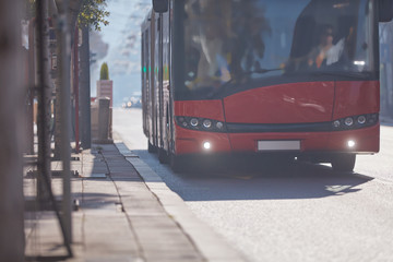 Public transportation / bus in urban surroundings on a station. © astrosystem