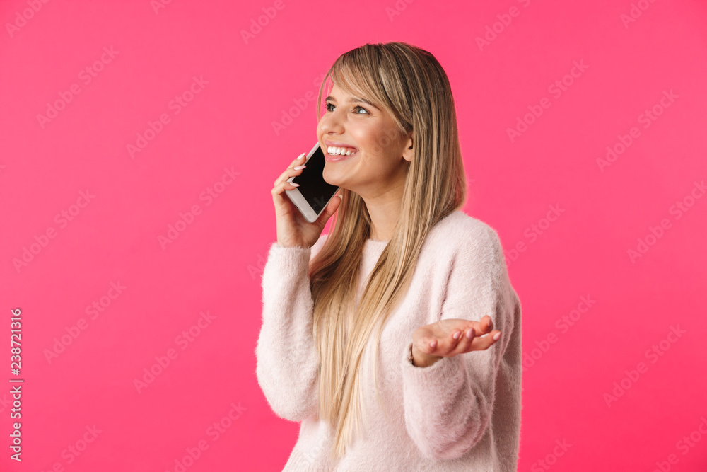 Canvas Prints Cheerful young blonde woman wearing sweater