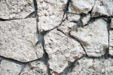 Fototapeta premium Perfect roman travertine brick wall texture. Lights and shadows very equlibrate. The brick alignment is sublimated by the diffused light.