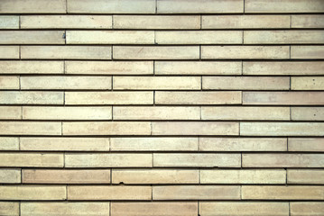 Perfect brick wall texture. Lights and shadows very equlibrate. A brick wall with very regular geometries. The porosity of the bricks and their alignment is sublimated by the diffused light.