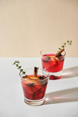 Christmas or Thanksgiving drink. Autumn and winter cocktail - grog, hot sangria, mulled wine with tea, lemon, rome, cinnamon, anise and other spices.