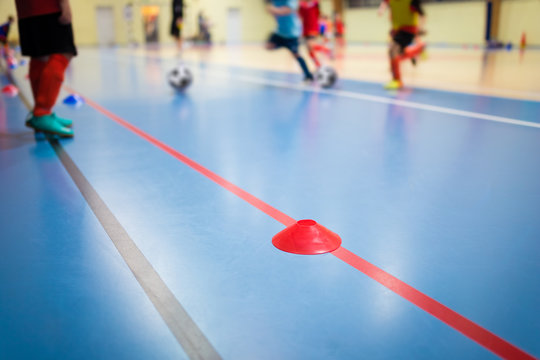Group of Kids Training Indoor Soccer Futsal. Children Physical Education Class. Gym Class for Youth. Futsal Training Picture with Blurred Background